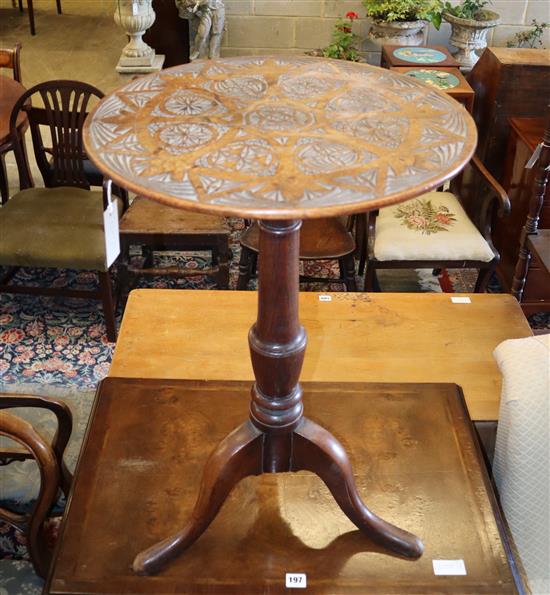 A tripod table with carved top, width 48cm, depth 48cm, height 72cm